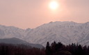 早春の北アルプスの夕景